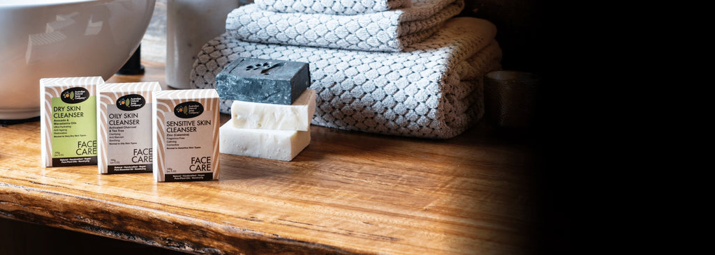 3 Natural Soap Company Face Cleansers on a wooden bench
